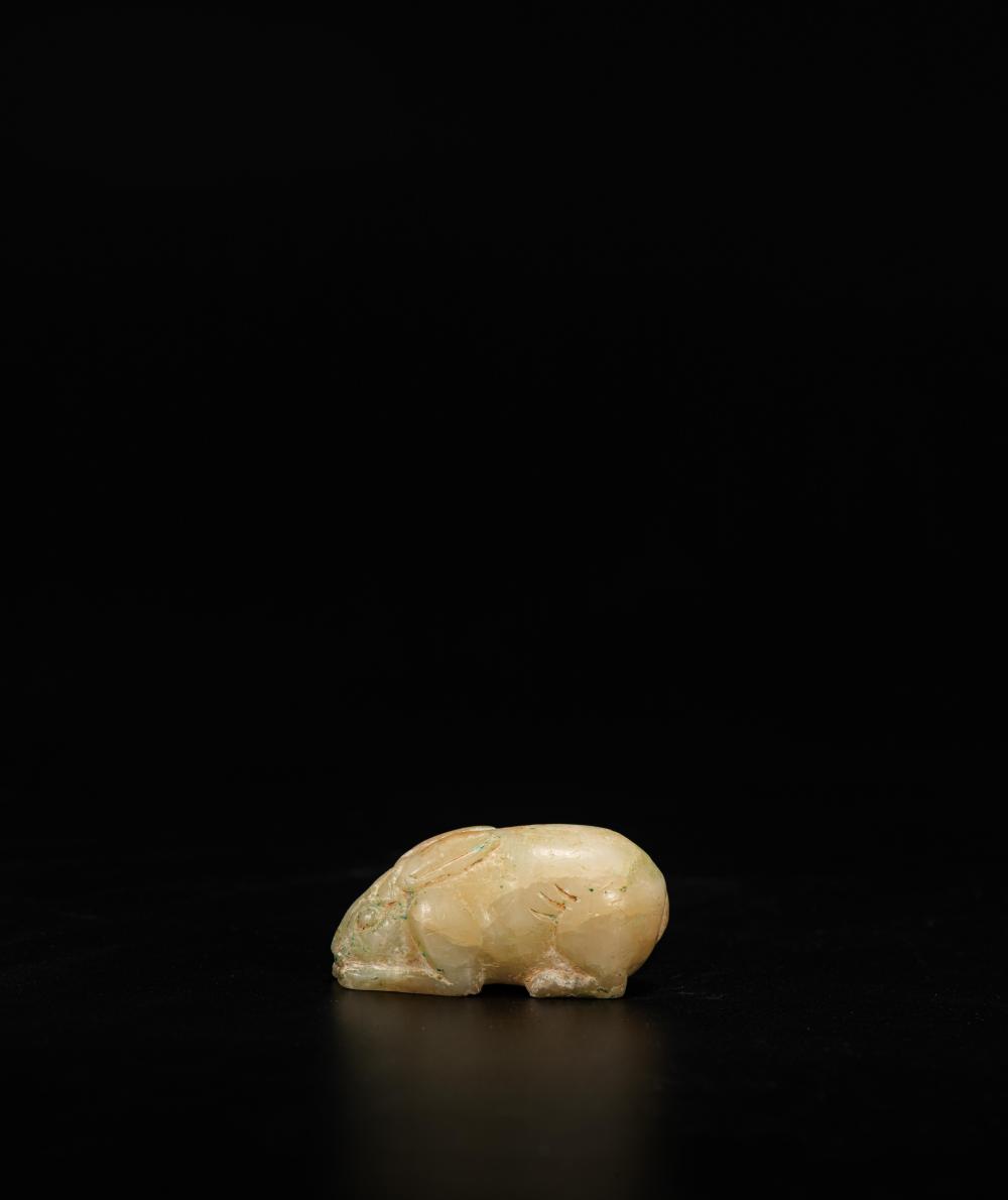 A TALC FIGURE OF RABBIT 唐.滑石臥兔