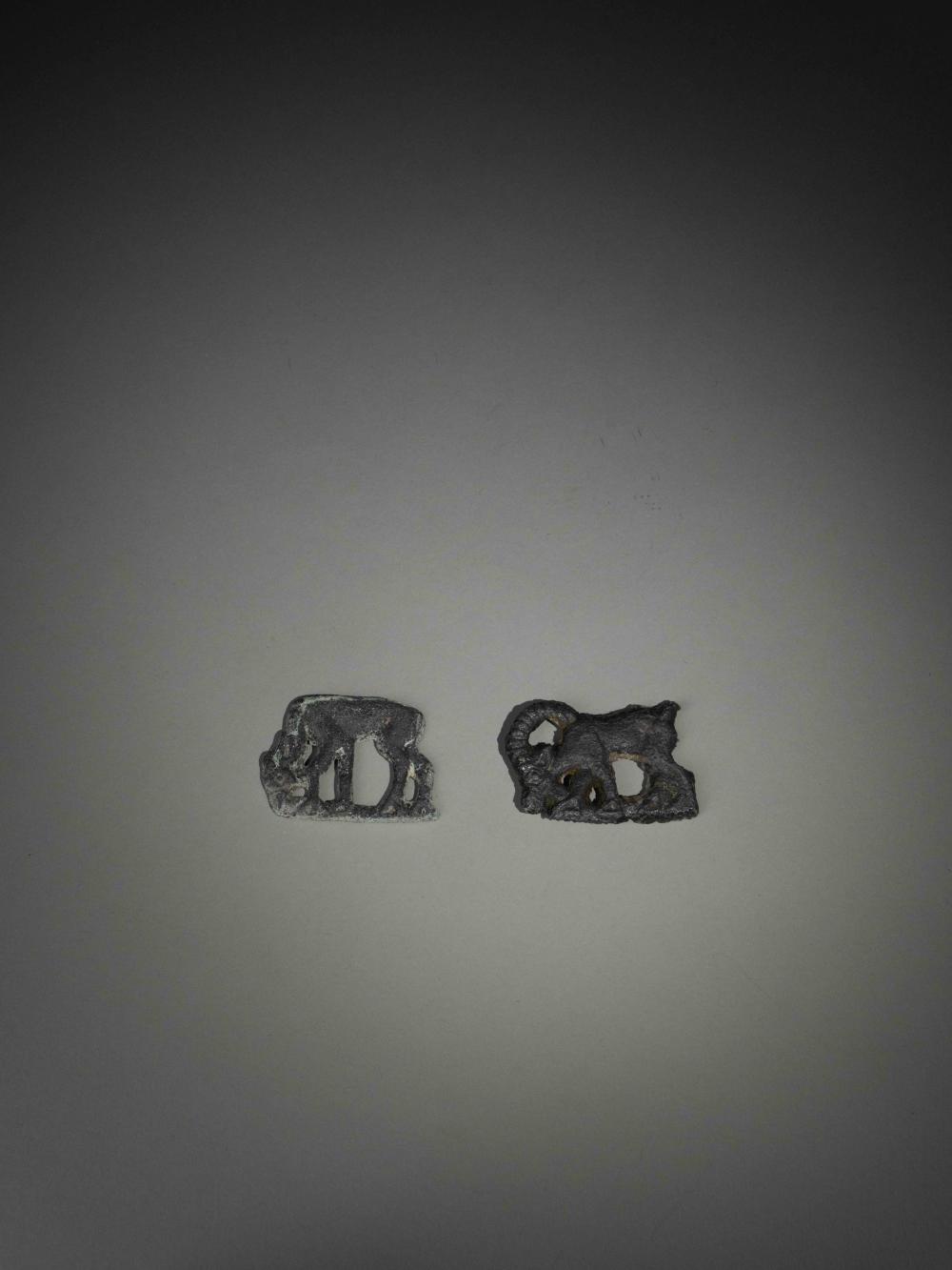A PAIR OF BRONZE 'GOAT' PLA... image