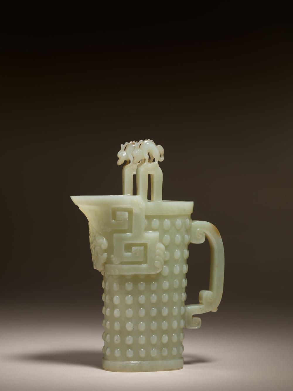 QING (1644-1911 A.D.) A WHITE JADE VESSEL, JUE 清 白玉仿古爵