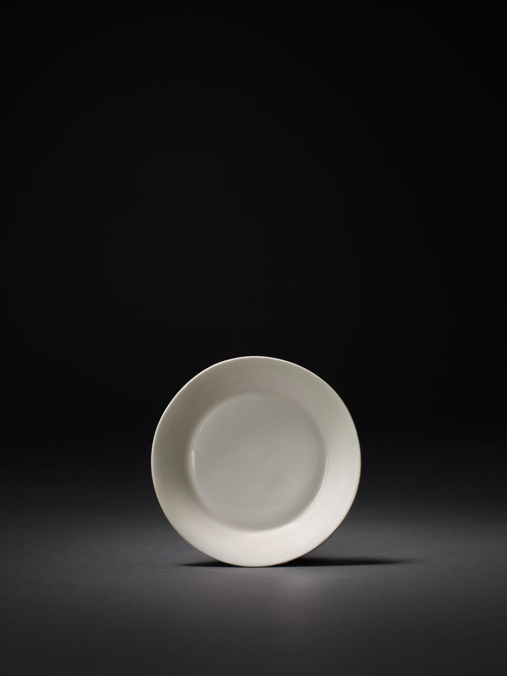 A 'JIEXOU' WHITE GLAZED DIS... image