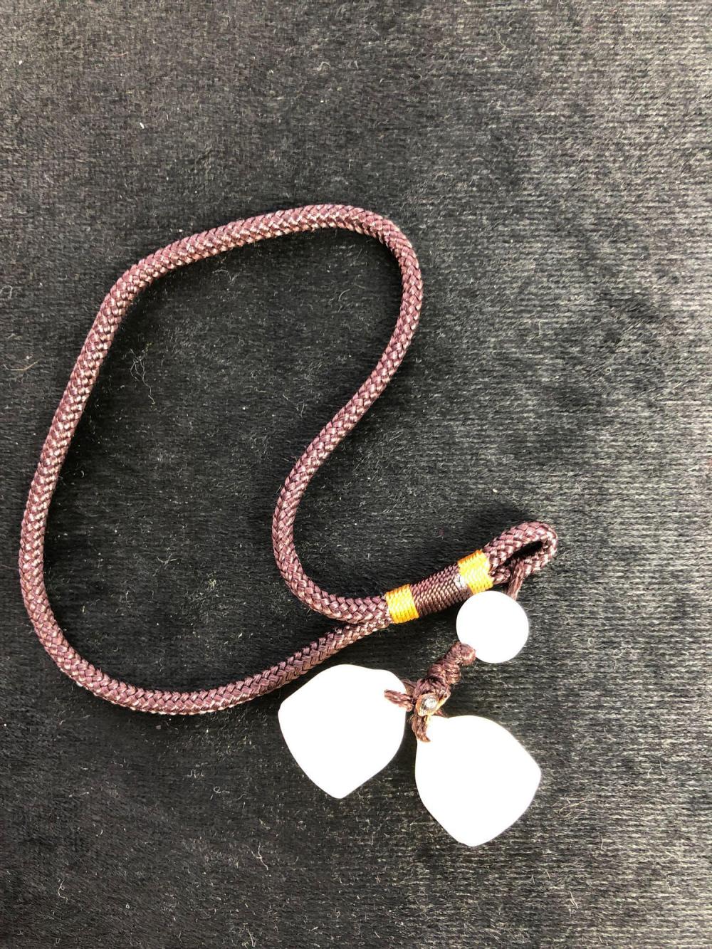 Two Chinese white jade lotus beads