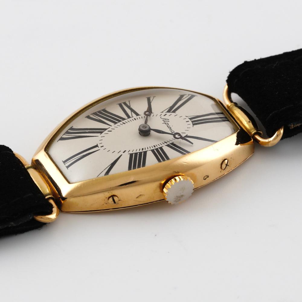 ALPINA Tonneau-shaped and curved, movement no. 1918054, case no. 534, circa 1920.
