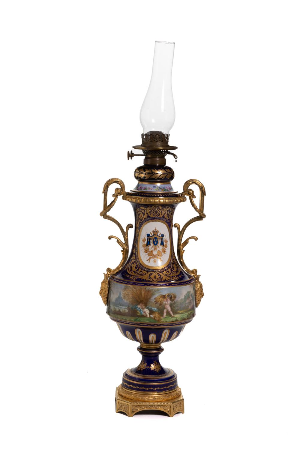 A Sèvres-style porcelain wick lamp