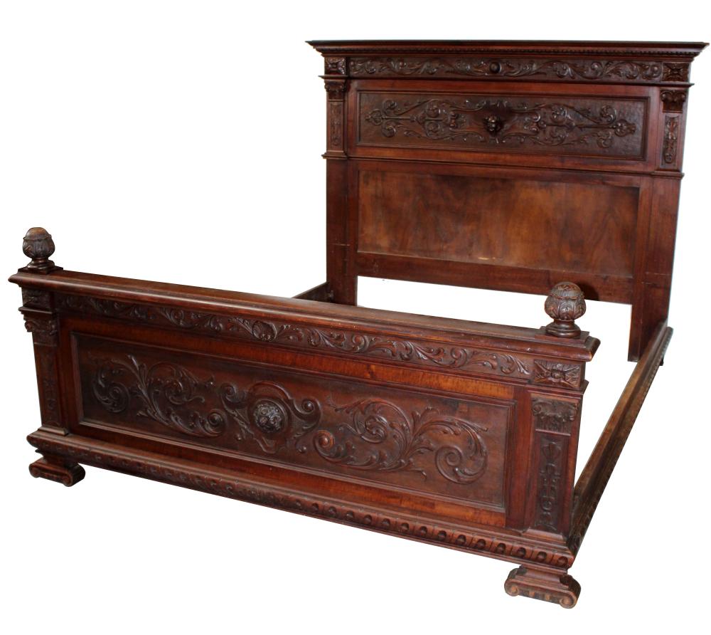 French Renaissance carved walnut bed with cherubs