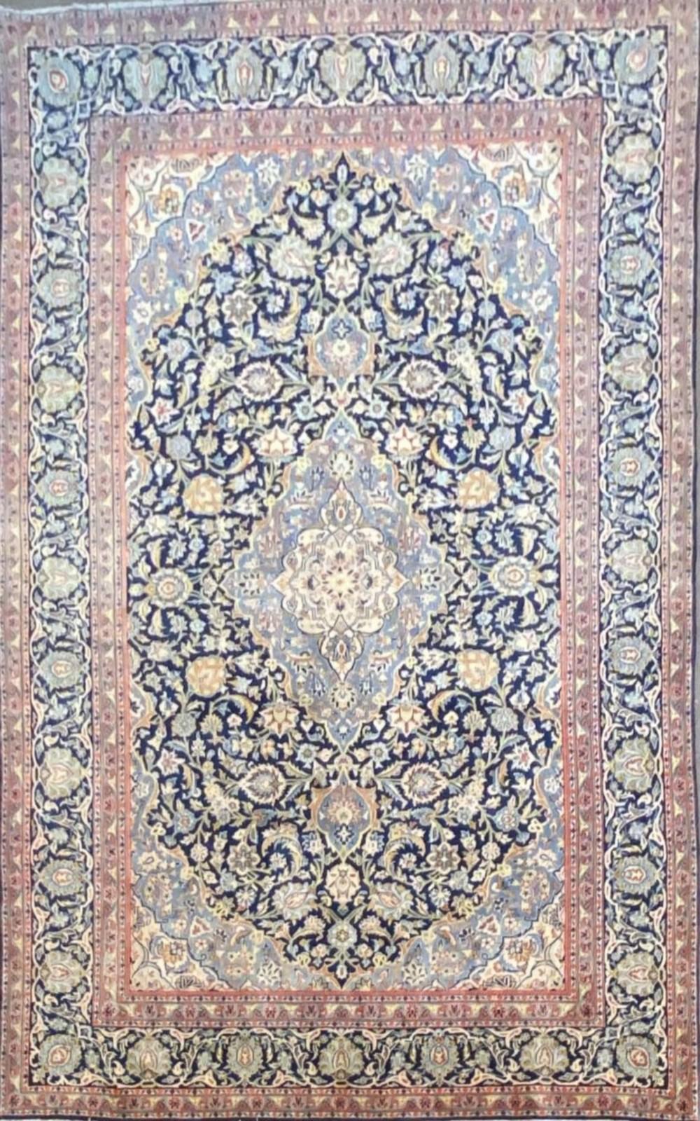A PERSIAN KASHAN CARPET (327 X 212 CM)