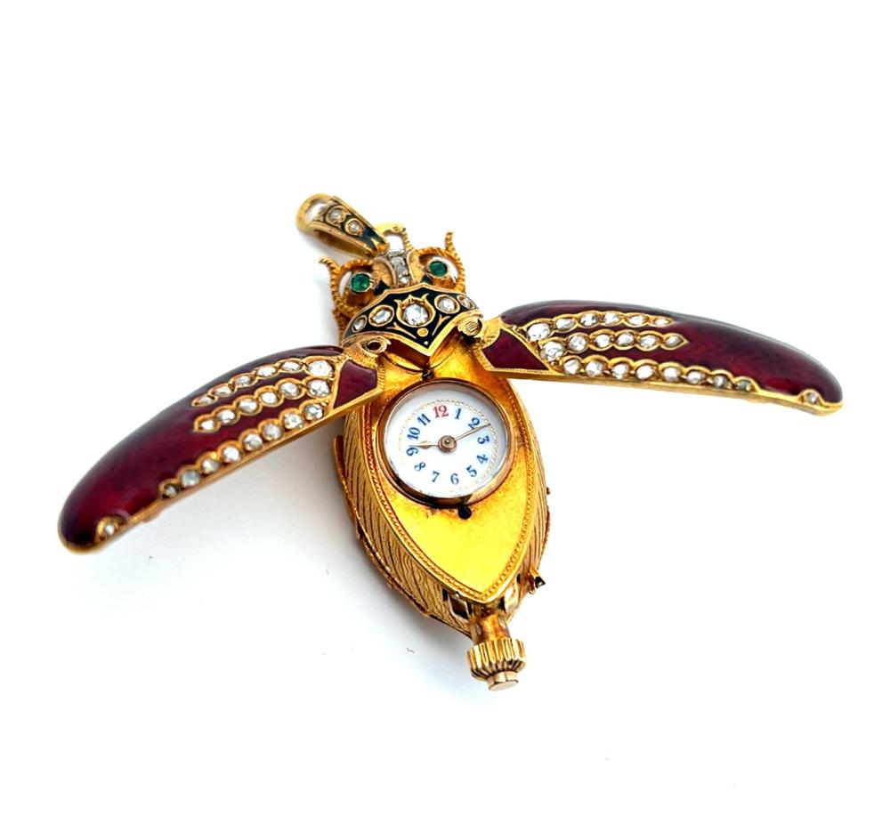 18K GOLD ENAMEL ROSE CUT DIAMOND AND EMERALD BEETLE FORM WATCH