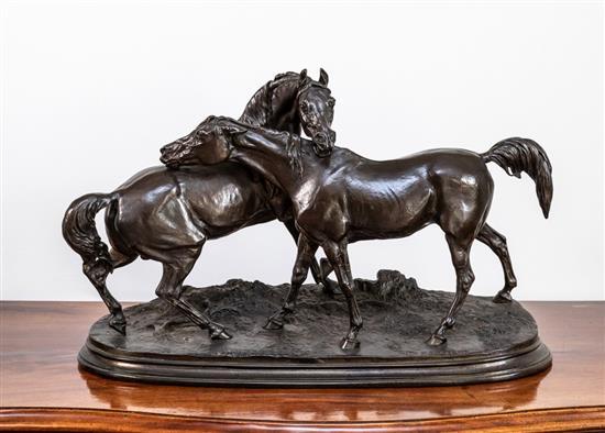 A bronzed cast iron group of a mare and a stallion, 'The Accolade' after the model by Pierre Jules Mene (1810-1879), possibly Russian
