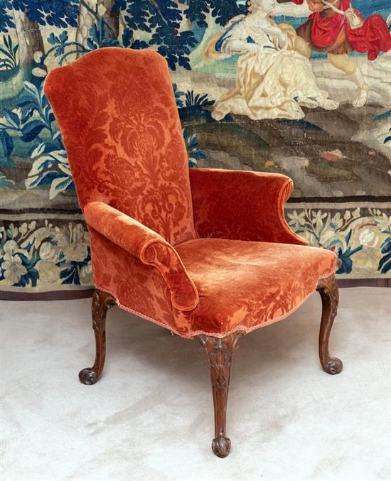 A George III mahogany easy armchair of smaller proportions, the rectangular shaped back,