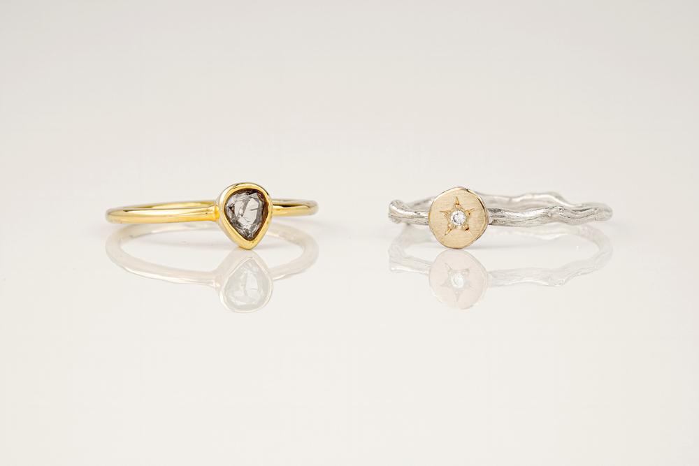 An 18ct yellow gold and clear stone ring together with a silver and diamond ring (2) the clear stone pear cut and in a bezel setting,