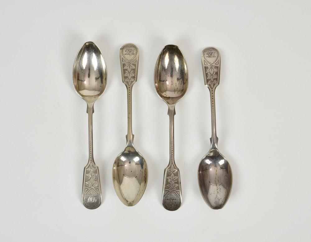 A set of four George V silver bright cut fiddle pattern tea spoons John Round & Son Ltd., Sheffield 1933, weight 2.75 tr.oz. (4)