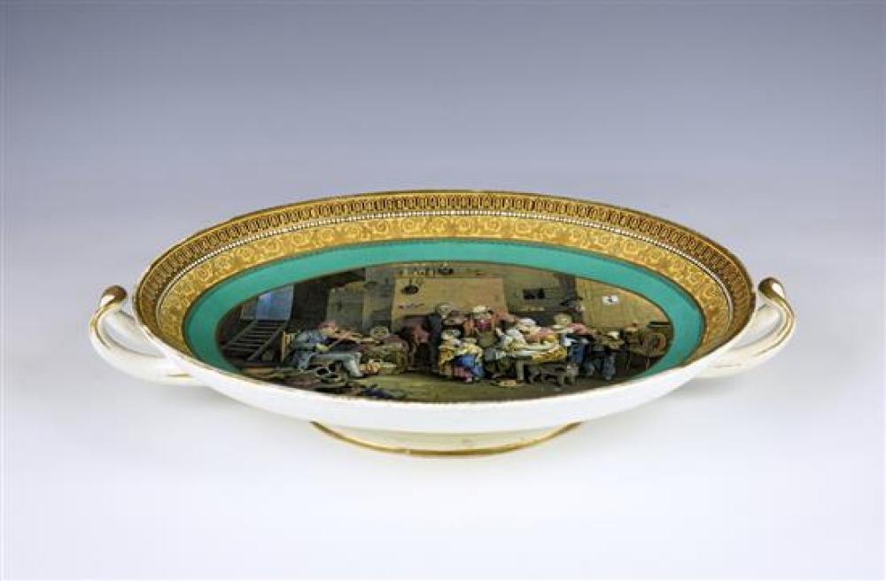 A two handled oval Prattware saucer dish 19th century, the interior scene of a family being entertained,