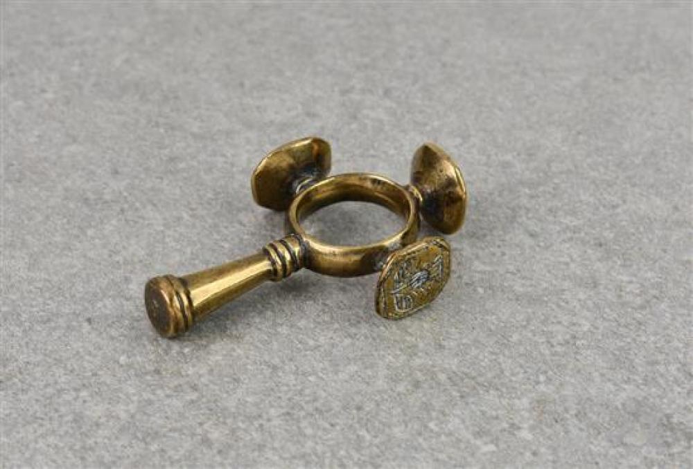 A polished bronze finger ring cruciform cigar tamper and seal combination probably late 18th century,