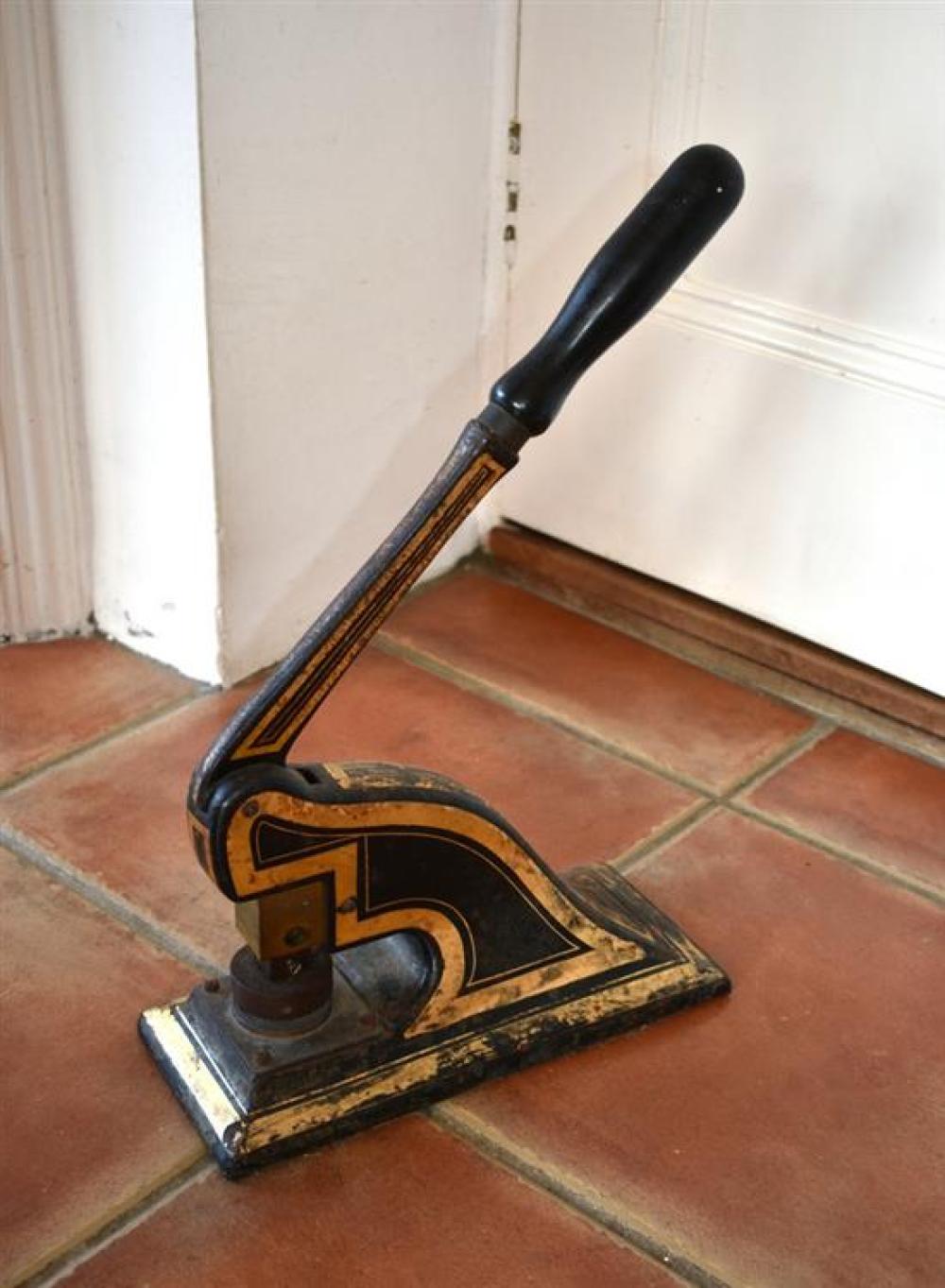 A large Victorian cast iron letter stamp with bronze die seal.