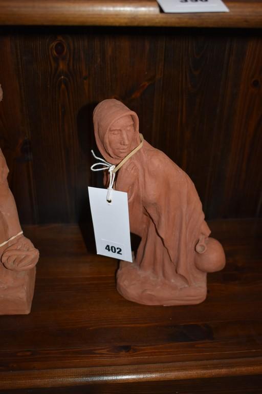 Water carrier - a terracotta model study by Leslie Harradine - Royal Doulton interest terracotta model study of robed woman carrying...