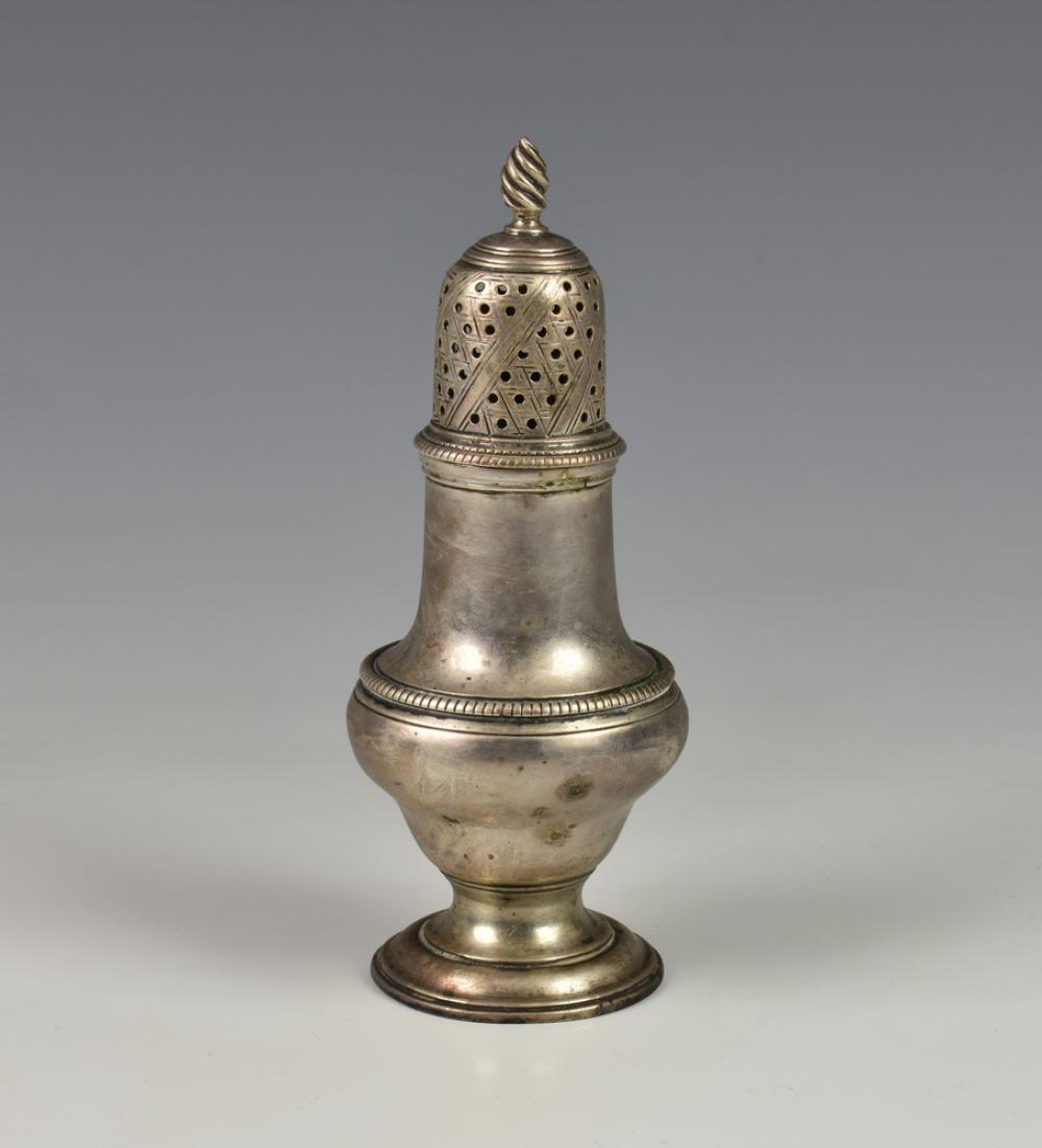 An early George III silver baluster pepper pot Jabez Daniell & James Mince, of typical form with dot pierced covers and flame finial,
