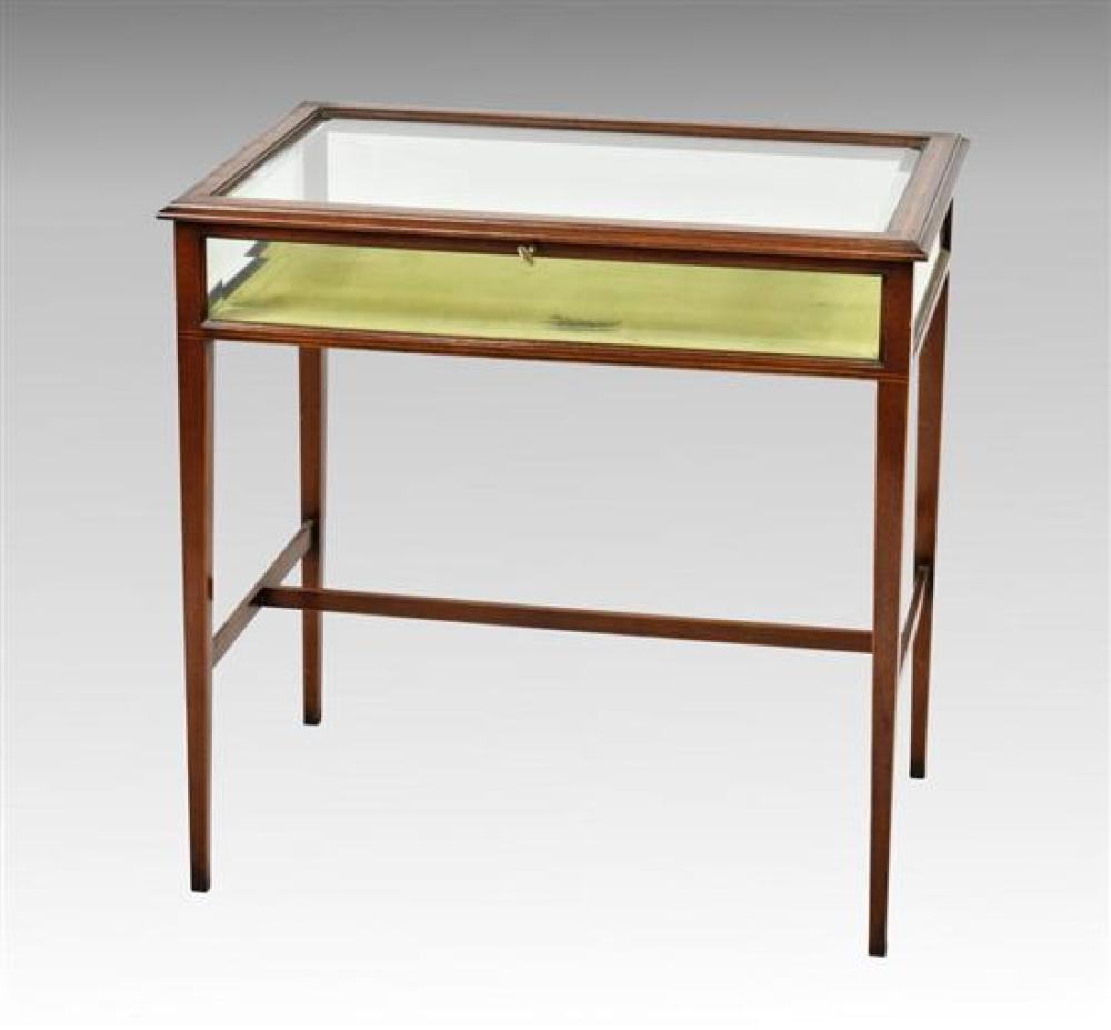 An Edwardian satinwood banded mahogany table vitrine with bevelled glass and green velvet interior,