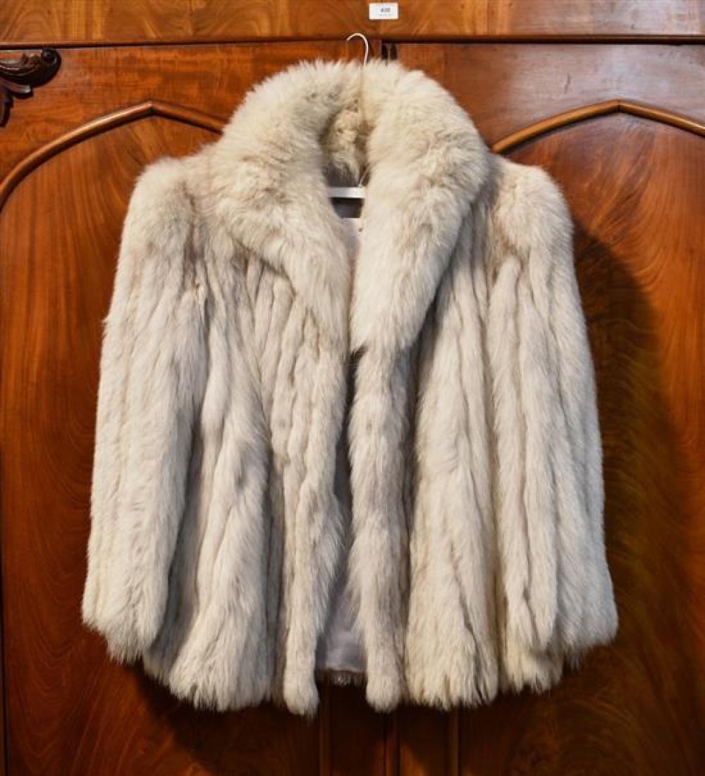 A silver fox fur short jacket by Dag Lavane, Wignehies, France, with three hook fastening, two front pockets and silver silk lining.