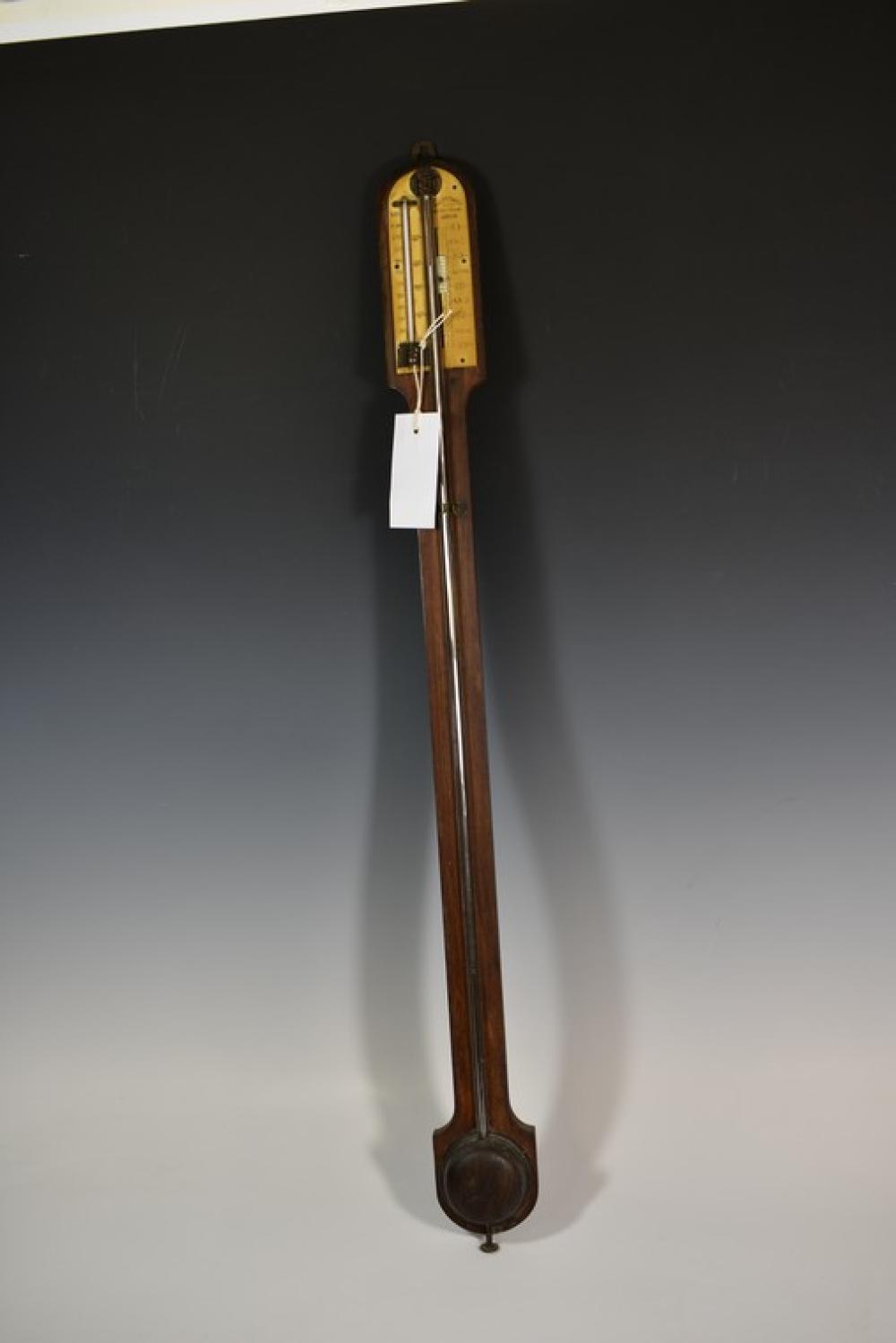 A mid-19th century rosewood stick barometer the arched top with ivorine scale signed 'J. H. Steward, 459 West Strand London',