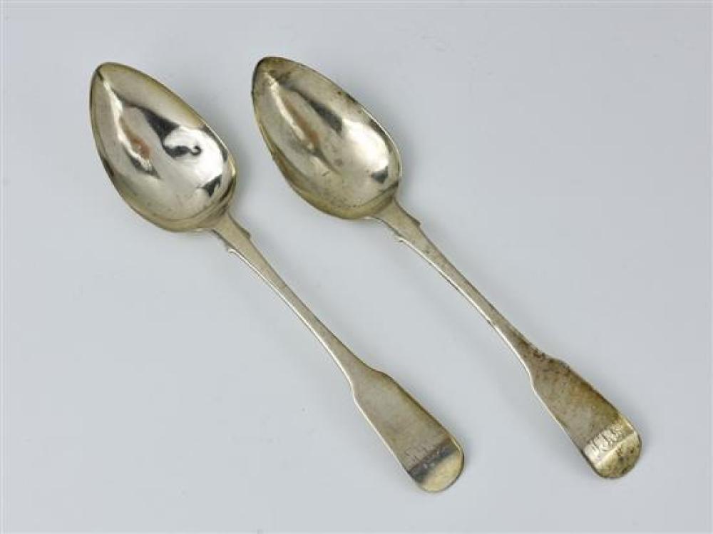 A pair of Channel Islands silver fiddle pattern table spoons maker's mark GH with crown above, struck once (George Hamon I and II,