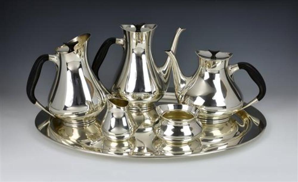 A Danish modernist EPNS five piece tea and coffee service and tray by Cohr, comprising of a teapot, coffee pot, hot water jug,