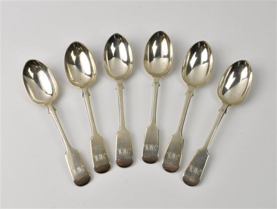 A set of six Channel Island silver fiddle pattern dessert spoons
