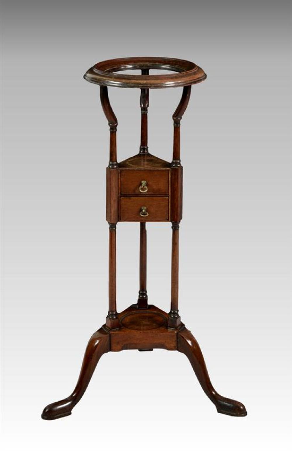 A George III mahogany wig stand the dished,
