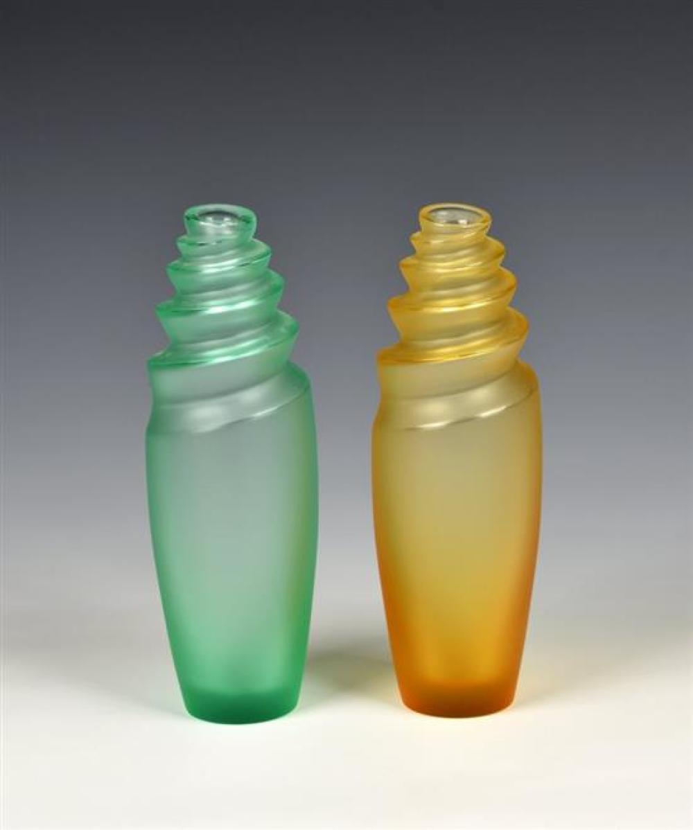 Two modern Lalique Cebu vases the pearlescent vases with swirl to the neck, one in amber, the other aqua green, each standing,