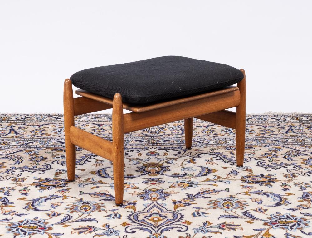 Paul Volther, a Danish teak footstool, with cushion: 15 1/2 x 23 1/2 x 17 in. (39.4 x 59.7 x 43.2 cm.)