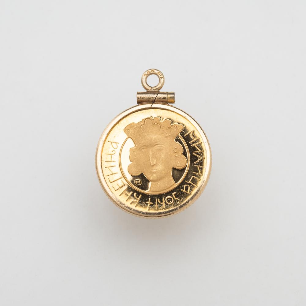 A 1971 Serbian commemorative coin .900 fine gold mounted as a pendant. 5/8 x 1 in. (1.6 x 2.5 cm.)