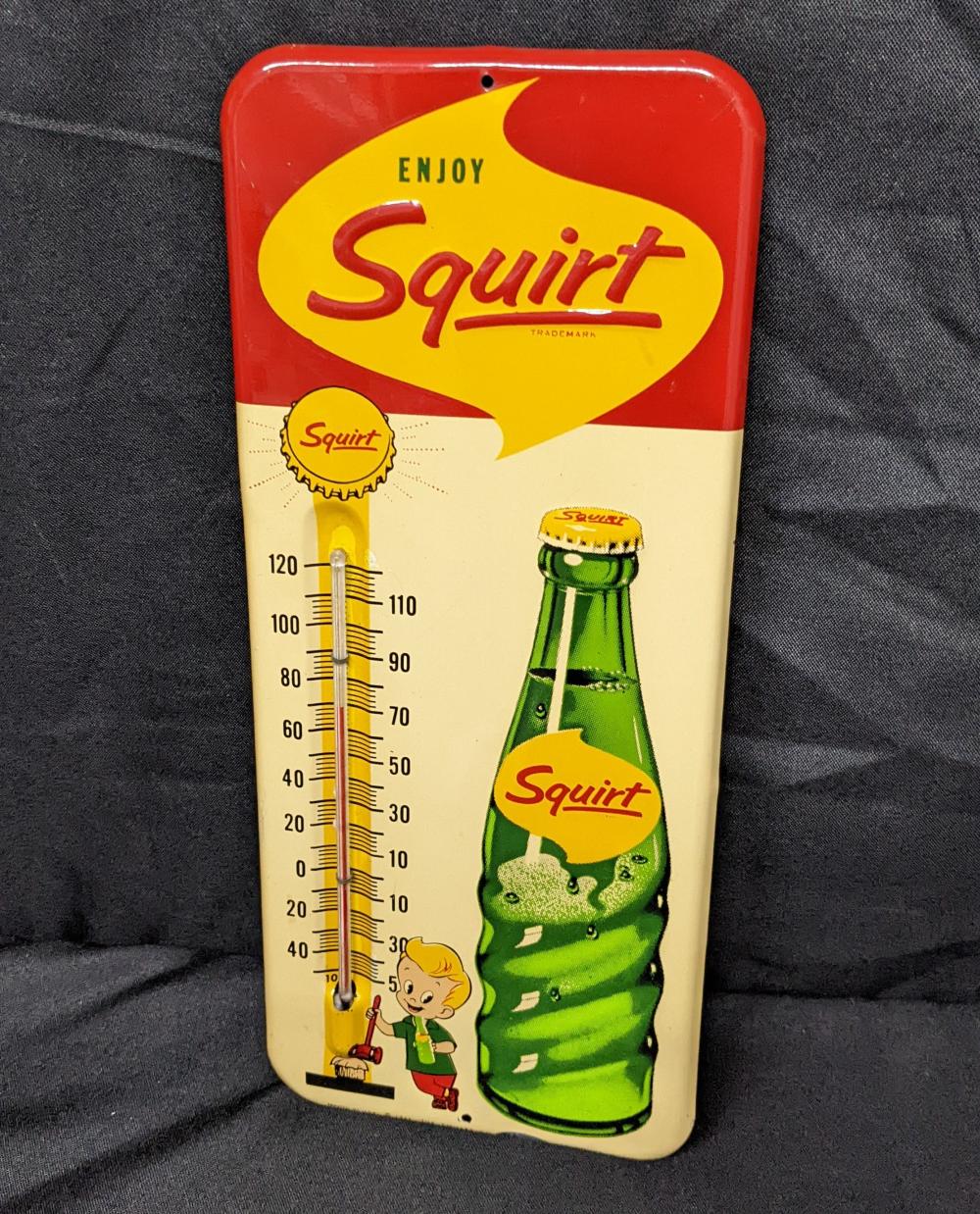EMBOSSED TIN THERMOMETER SIGN ENJOY SQUIRT SODA