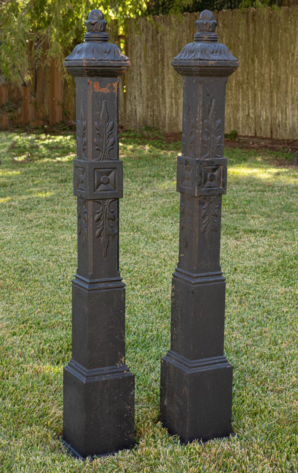 Pair of American Cast-Iron Garden District Fence Posts h. 54 in., w. 6 3/4 in., d. 6 3/4 in.