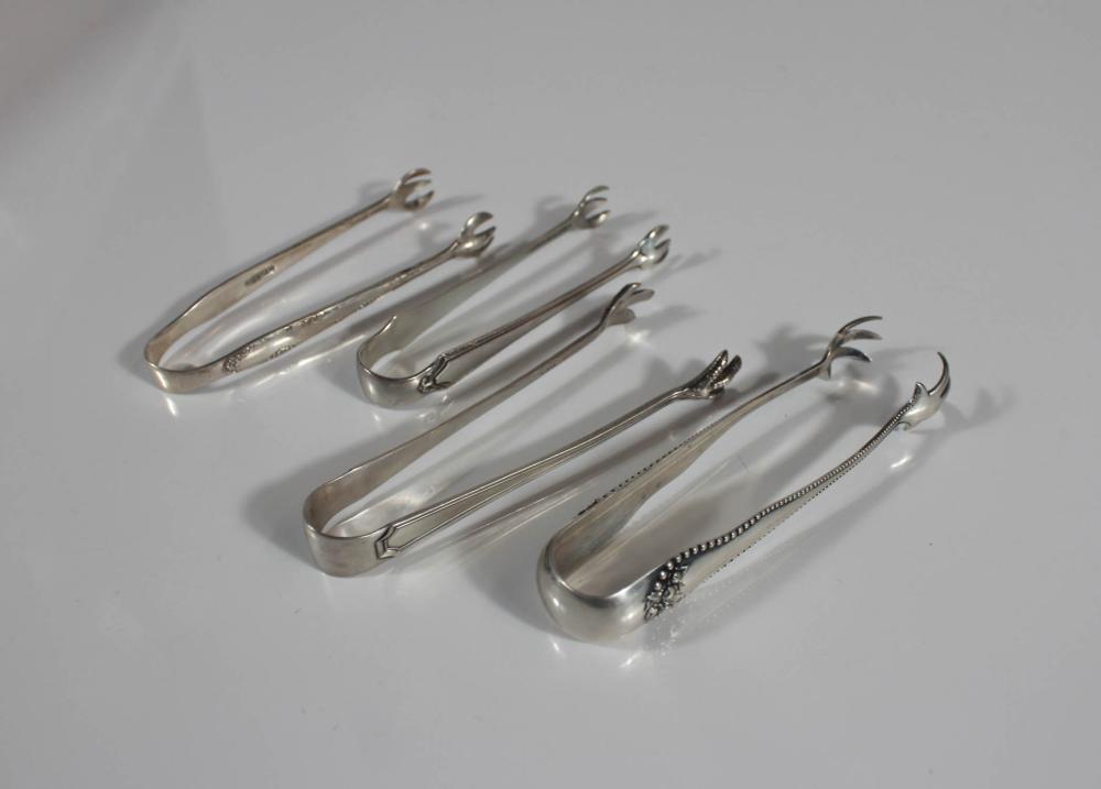 FOUR STERLING SILVER SUGAR TONGS