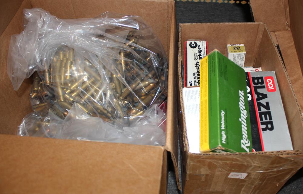 TWO BOXES OF AMMUNITION AND BRASS.