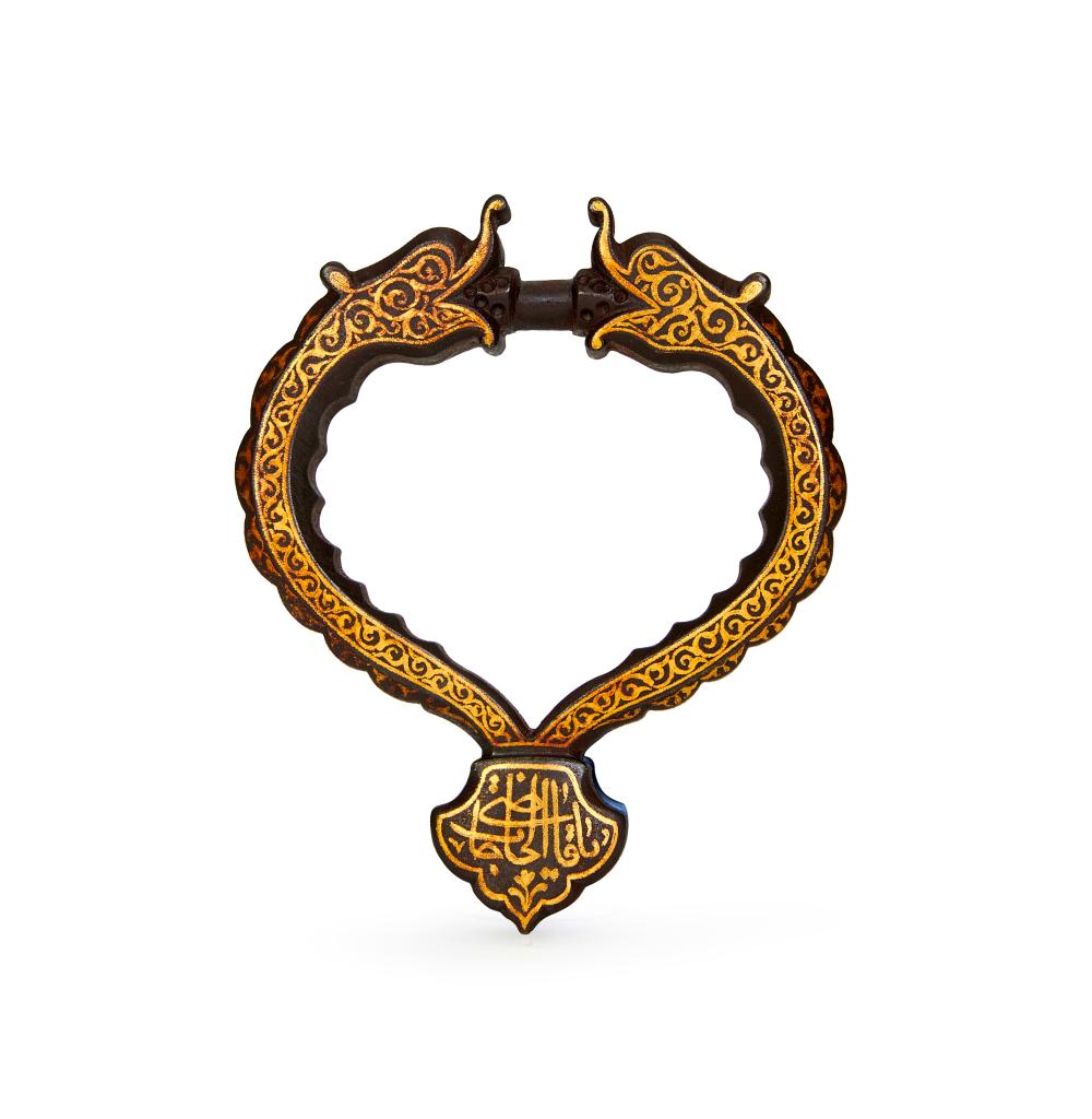 A GOLD DAMASCENED INSCRIBED DOOR KNOCKER, SAFAVID, 17TH CENTURY, PERSIA