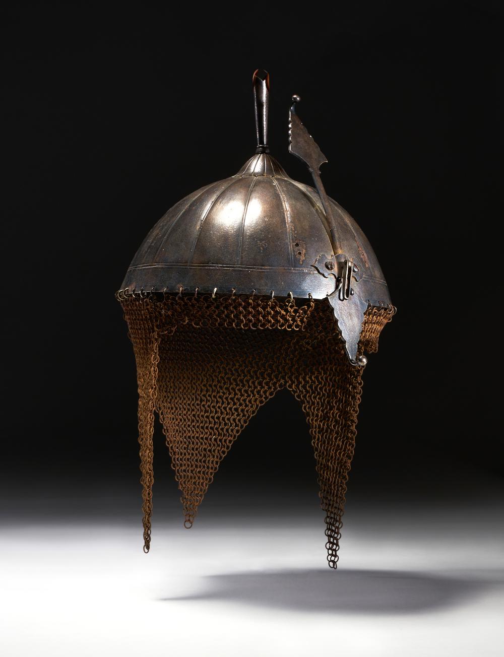A QAJAR WATERED-STEEL HELMET, IRAN, 19TH CENTURY