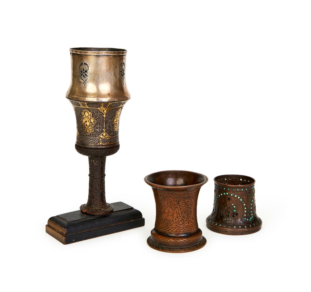A SET OF QAJAR STEEL HUQQA TOPS. 19TH CENTURY