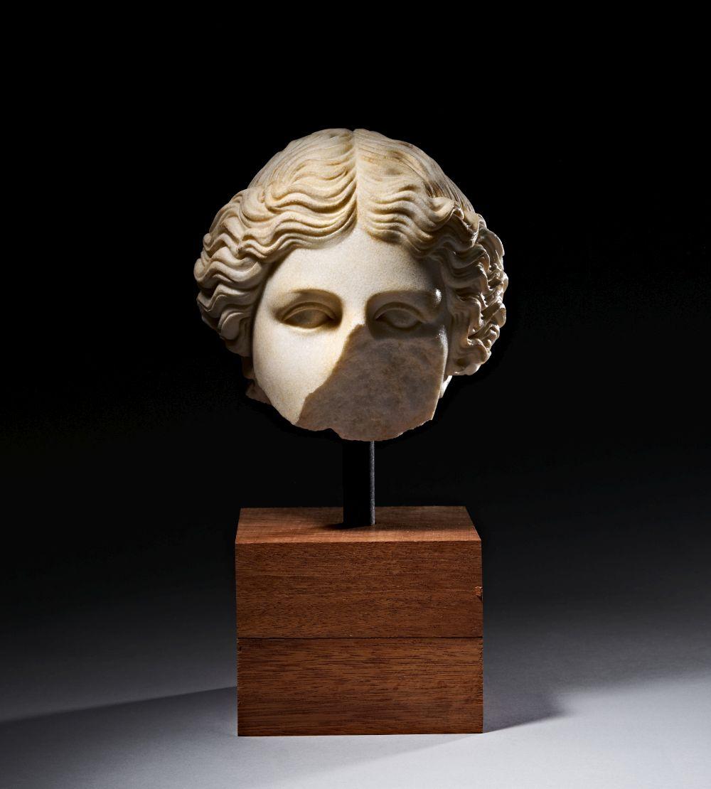 A ROMAN MARBLE HEAD OF AN AMAZON, CIRCA 2ND CENTURY A.D.