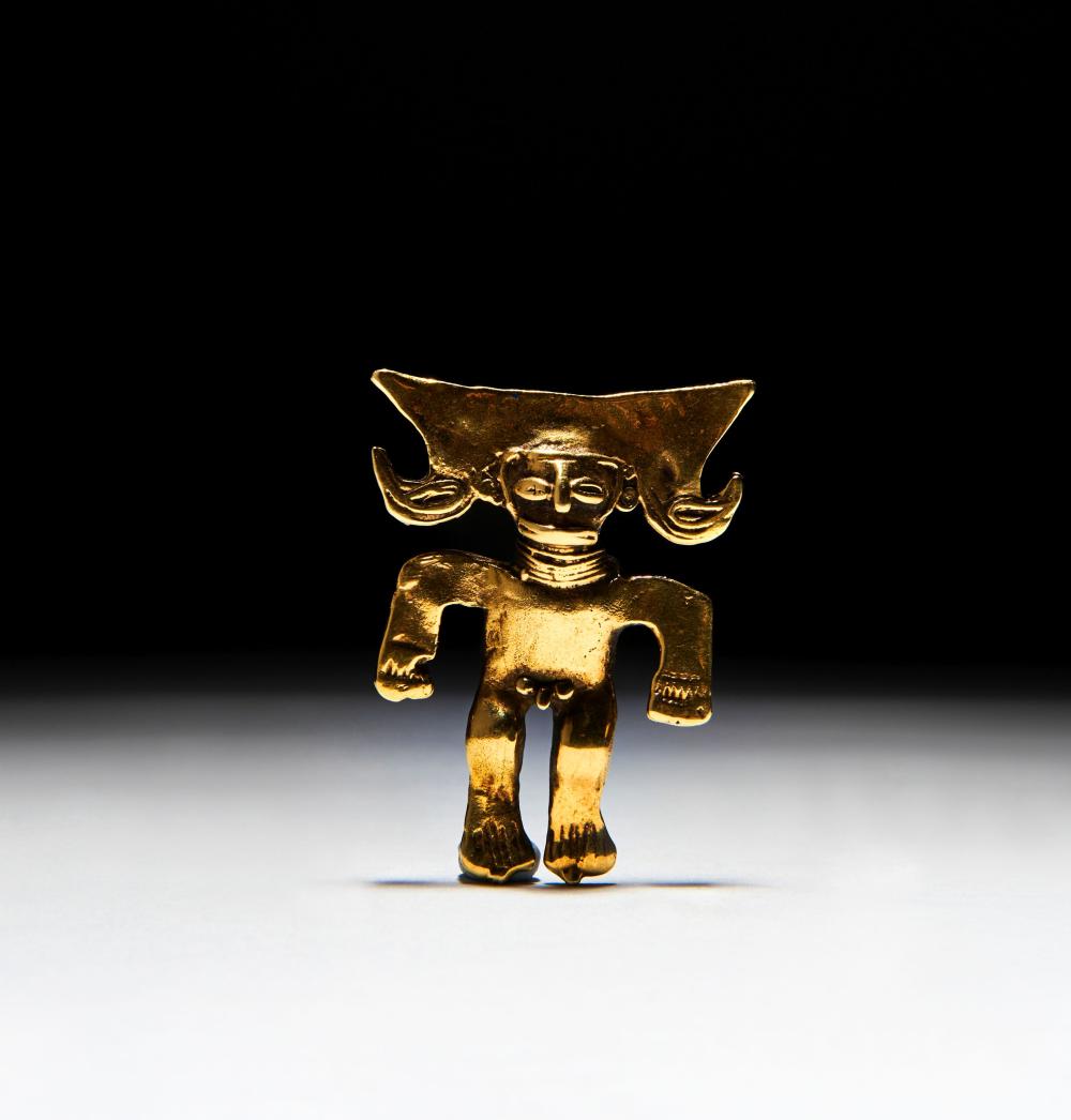 A PRE COLOMBIAN GOLD FIGURE, CIRCA 800-1200 A.D