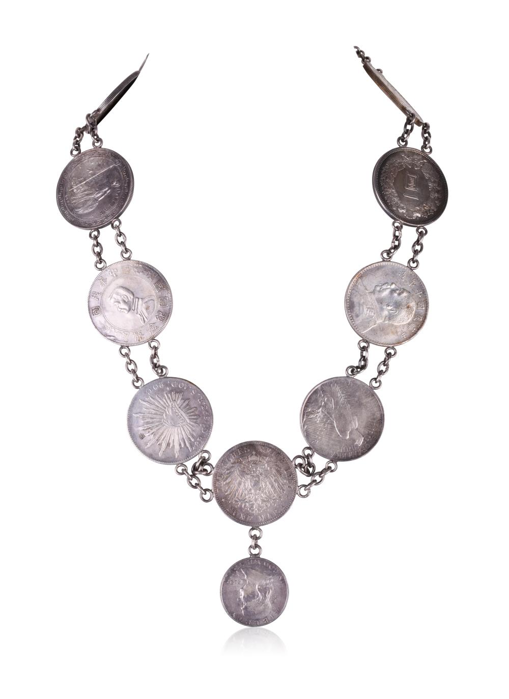 NECKLACE OF SILVER DOLLARS, AMERICAN, CHINESE, JAPANESE AND MEXICAN, EARLY 20TH CENTURY
