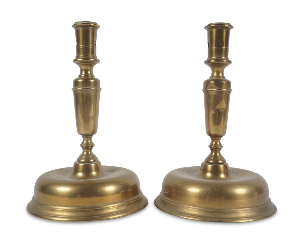 PAIR OF SOUTHERN EUROPEAN BRASS CANDLESTICKS, FIRST QUARTER 18TH CENTURY Height: 8 1/2 in. (21.6 cm.)