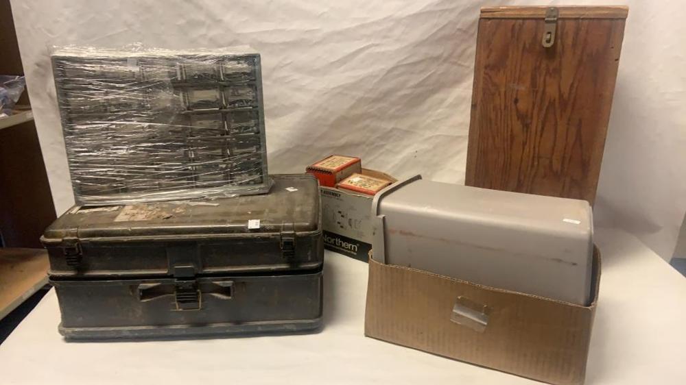 several boxes with nut, bolts and hardware