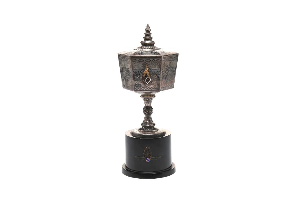 A silver black niello trophy decorated with Thai characters Sor Kor alternated with Thai mask pattern