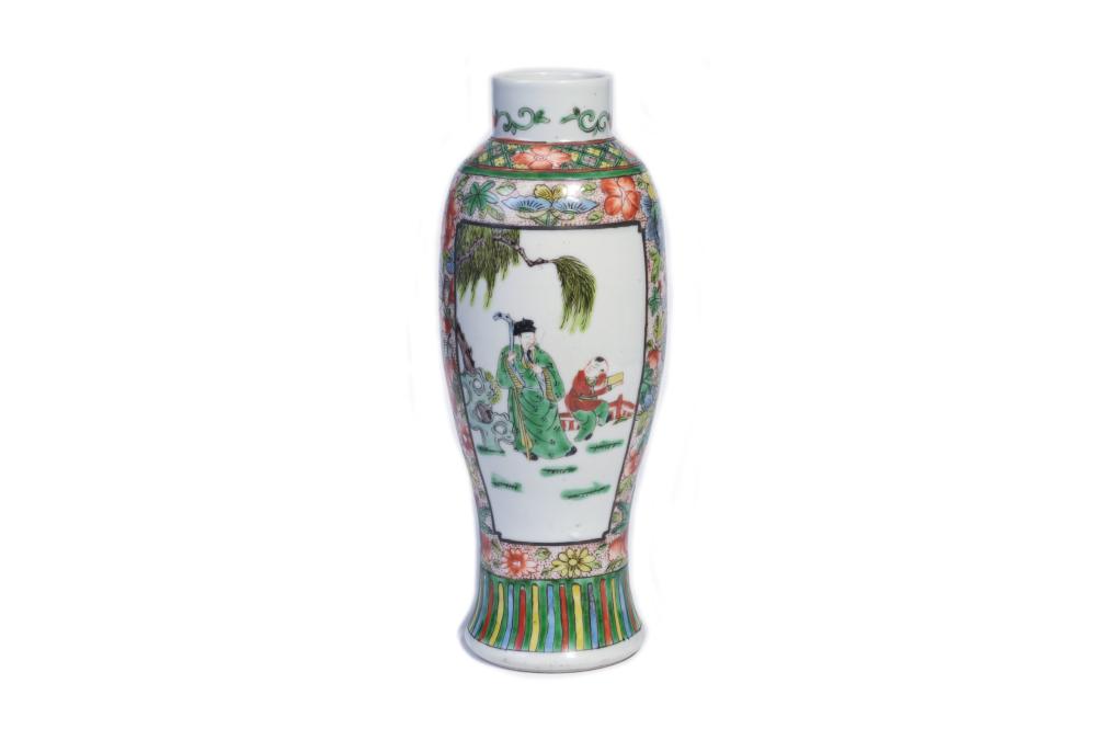 A polychrome porcelain vase painted with nobleman, children and court ladies in the garden