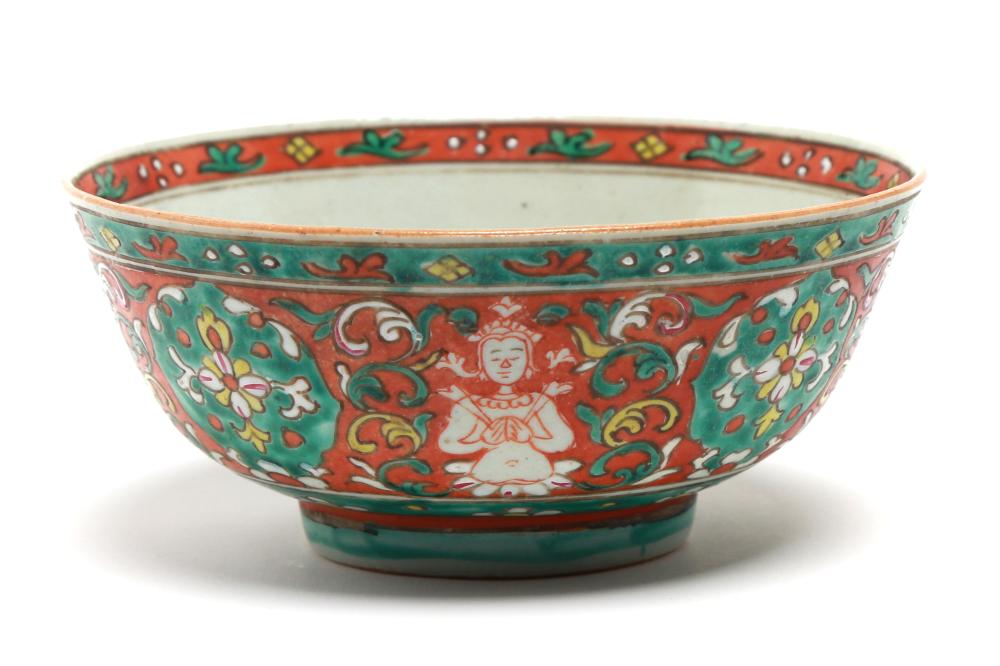 A Benjarong bowl painted with Theppanom alternating with floral vine scrolls on a red ground