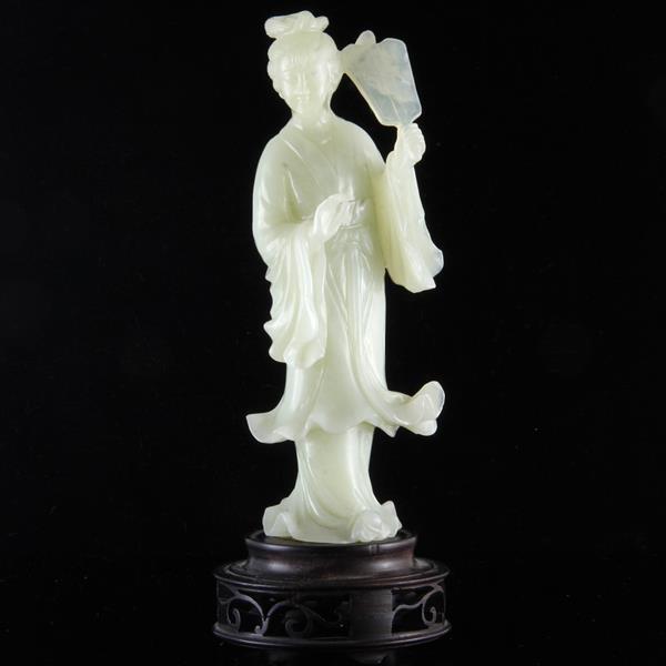 Chinese carved jade Guanyin / Immortal figure with fan on stand.