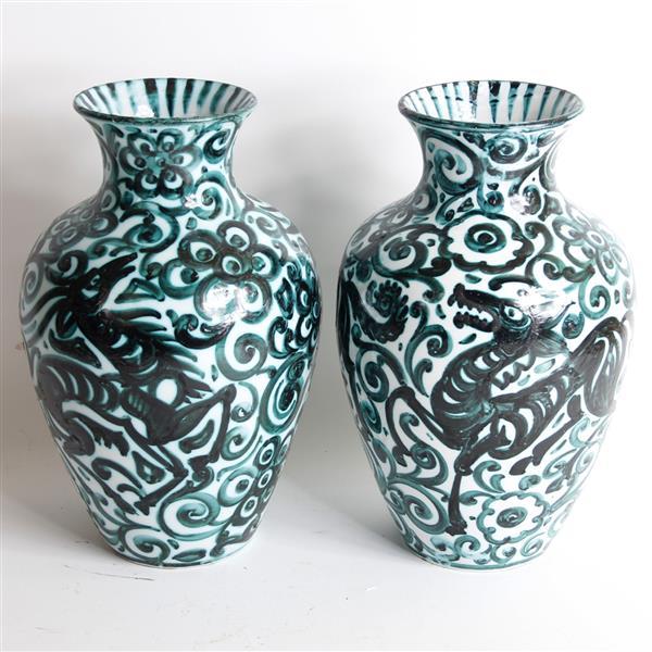 Pair Italian majolica vases with monotone green stylized horse and floral hand painted decoration.