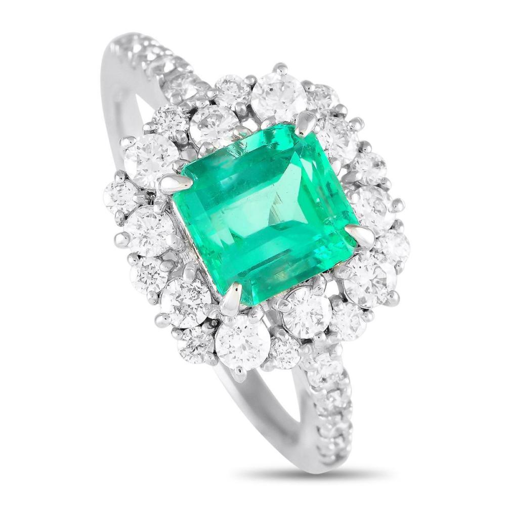 PLATINUM 0.65CT DIAMOND AND EMERALD RING