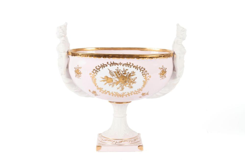 CONTINENTAL PORCELAIN CENTERPIECE WITH CARYATID ADORNMENTS