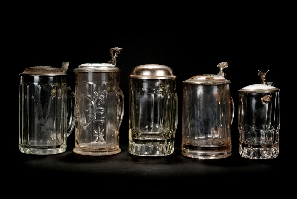 FIVE CLEAR GLASS BEER STEINS