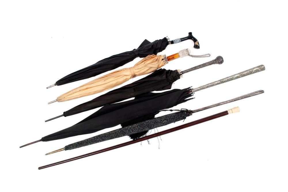 FIVE UMBRELLAS AND WALKING STICK
